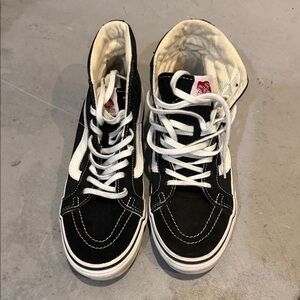 Vans Black and White High-Top Sneakers